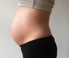 Живот на 30-ой неделе беременности